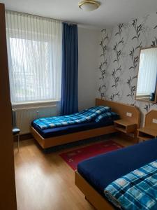 Postel nebo postele na pokoji v ubytování Easyrooms