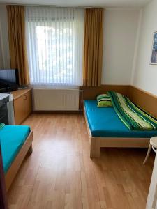 Postel nebo postele na pokoji v ubytování Easyrooms + 5 fotografií