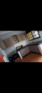 an overhead view of a room with wooden floors and ceilings at Serenity Space in Kampala