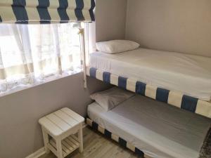 Ένα ή περισσότερα κρεβάτια σε δωμάτιο στο Two bedroom on Trotter