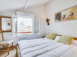Katil atau katil-katil dalam bilik di Apartment Les écureuils by Interhome