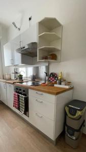 O bucătărie sau chicinetă la My Place in Como