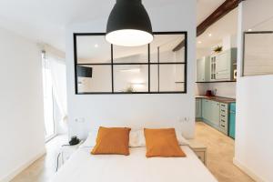 Posteľ alebo postele v izbe v ubytovaní Loft Alguer en Ametlla de Mar