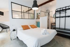 Posteľ alebo postele v izbe v ubytovaní Loft Alguer en Ametlla de Mar
