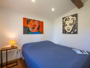 Ένα ή περισσότερα κρεβάτια σε δωμάτιο στο Holiday Home Maison Mime by Interhome