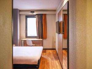 Postel nebo postele na pokoji v ubytování Ibis Valladolid