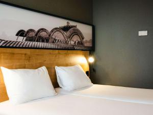 Postel nebo postele na pokoji v ubytování Ibis Valladolid
