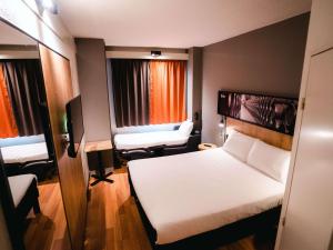 Postel nebo postele na pokoji v ubytování Ibis Valladolid