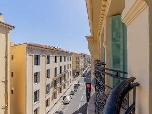 a view of a city street from a balcony at ibis Nice Centre Notre Dame in Nice