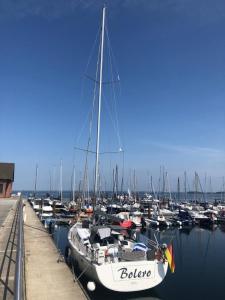 a group of boats docked in a harbor at Zu Fuß zum Strand - familienfreundlich zwischen Wismar und Boltenhagen Wallbox am Haus! in Beckerwitz