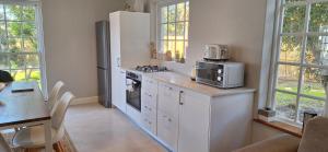Kuchyň nebo kuchyňský kout v ubytování 4 Periwinkle Place + 13 fotografií