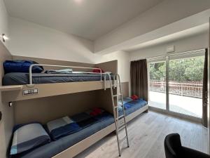 Krevet ili kreveti u jedinici u okviru objekta Hostelum