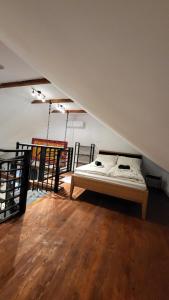 Postel nebo postele na pokoji v ubytování Apartmány pod Prašivou