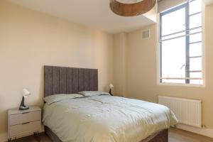 Letto o letti in una camera di Dublin Castle Suites