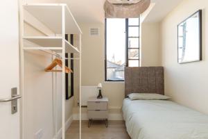Letto o letti in una camera di Dublin Castle Suites