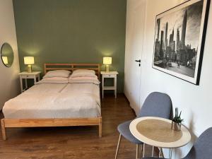 Postel nebo postele na pokoji v ubytování Pokoje Gościnne Beatka