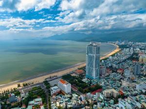an aerial view of a city and the beach at Condotel TMS HOÀNG GIA VIEW BIỂN, TÒA NHÀ CAO NHẤT QUY NHƠN in Quy Nhon