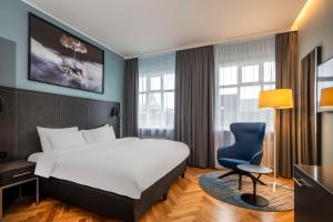 Postel nebo postele na pokoji v ubytování Radisson Blu 1919 Hotel, Reykjavík