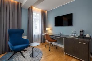TV a/nebo společenská místnost v ubytování Radisson Blu 1919 Hotel, Reykjavík