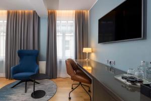 TV a/nebo společenská místnost v ubytování Radisson Blu 1919 Hotel, Reykjavík