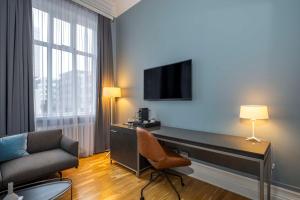 TV a/nebo společenská místnost v ubytování Radisson Blu 1919 Hotel, Reykjavík
