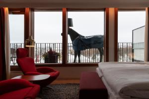 Voodi või voodid majutusasutuse Avalon Hotel toas