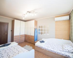 Postel nebo postele na pokoji v ubytování Premium Lazur - Sea garden Burgas - TOP Location 5 min to the Beach