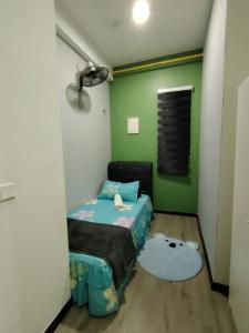 Postel nebo postele na pokoji v ubytování Putrajaya AQ Homestay (Near PICC) + 11 fotografií