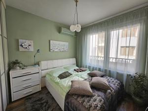 Postel nebo postele na pokoji v ubytování Bright Inn - Holiday & Business Apartment