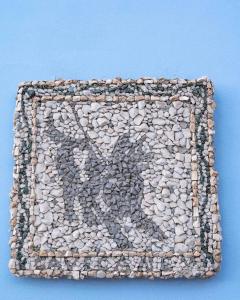 a mosaic of rocks on a blue background at DIMORA BORDIN Luxury Aparthotel Animali ammessi in Nettuno