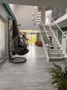 Φωτογραφία από το άλμπουμ του The LiliHill House jezioro, sauna, balii, las σε Sząbruk