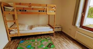 Ένα ή περισσότερα κρεβάτια σε δωμάτιο στο Happy Hero Reisen Ferienwohnungen auf Usedom nahe Achterwasser