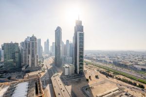 an aerial view of a city with tall buildings at GuestReady - Glamourous home in Downtown Dubai in Dubai