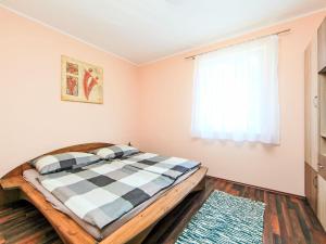 Posteľ alebo postele v izbe v ubytovaní Apartment Beige by Interhome + 8 fotografií