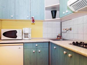 Kuchyňa alebo kuchynka v ubytovaní Apartment Cortaderia 1 by Interhome