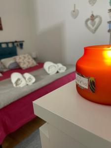 A bed or beds in a room at ORTIGIA 26