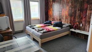 Postel nebo postele na pokoji v ubytování Pension Garni Zur Schamper Mühle + 123 fotografií