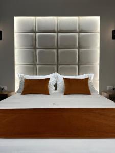 Ένα ή περισσότερα κρεβάτια σε δωμάτιο στο Gold Luxury House Durres