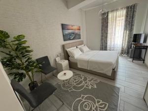 Postel nebo postele na pokoji v ubytování Casa L'Aquila