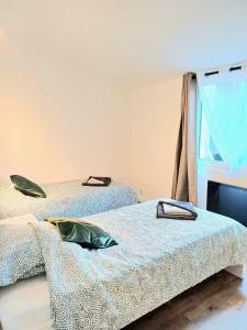 Un ou plusieurs lits dans un hébergement de l'établissement Beauvais - Proche Aéroport - Chambres Privées