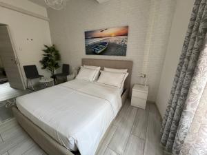 Postel nebo postele na pokoji v ubytování Casa L'Aquila