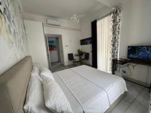 TV a/nebo společenská místnost v ubytování Casa L'Aquila