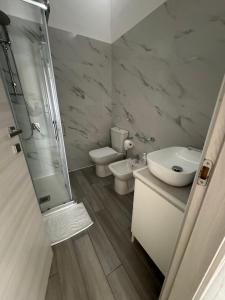 Koupelna v ubytování Casa L'Aquila