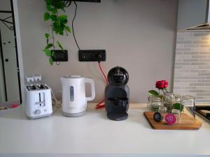 Cucina o angolo cottura di Elegant Smart Suite with Free Parking