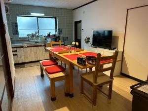 Kuchyň nebo kuchyňský kout v ubytování GuestHouse" Ro "Umegato