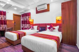 Postel nebo postele na pokoji v ubytování Hotel Intourist Palace