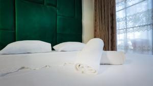 Łóżko lub łóżka w pokoju w obiekcie Todo apartements