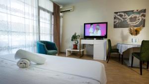 Łóżko lub łóżka w pokoju w obiekcie Todo apartements