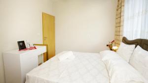 Łóżko lub łóżka w pokoju w obiekcie Todo apartements