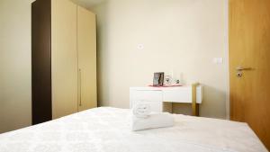 Łóżko lub łóżka w pokoju w obiekcie Todo apartements